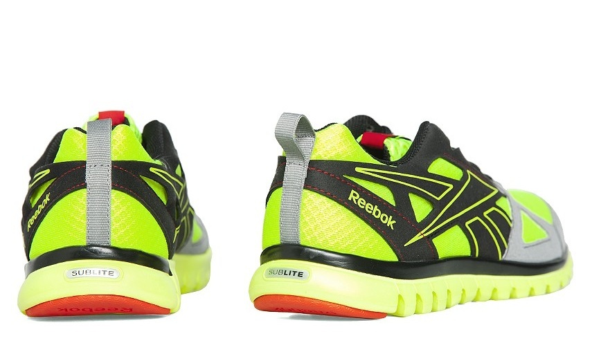 Favor Plata Mono Reebok Hombre SubLite Prime Running (Amarillo/Negro/Gris)